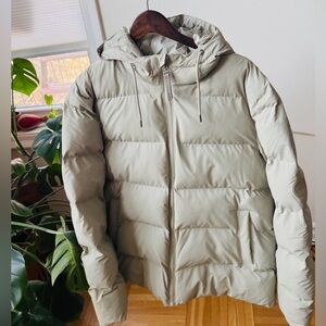 Rains.. warm, waterproof , windproof winter jacket. Unisex , size Large.